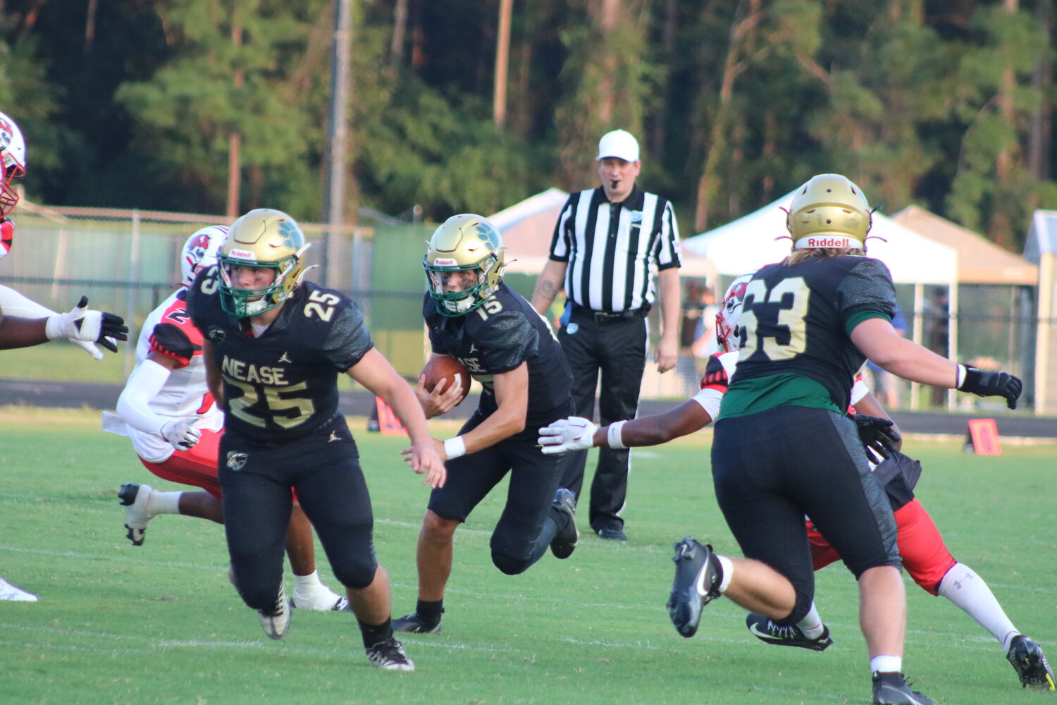 Nate Harry (No. 15) leads the offensive attack against Fletcher on Sept. 15.